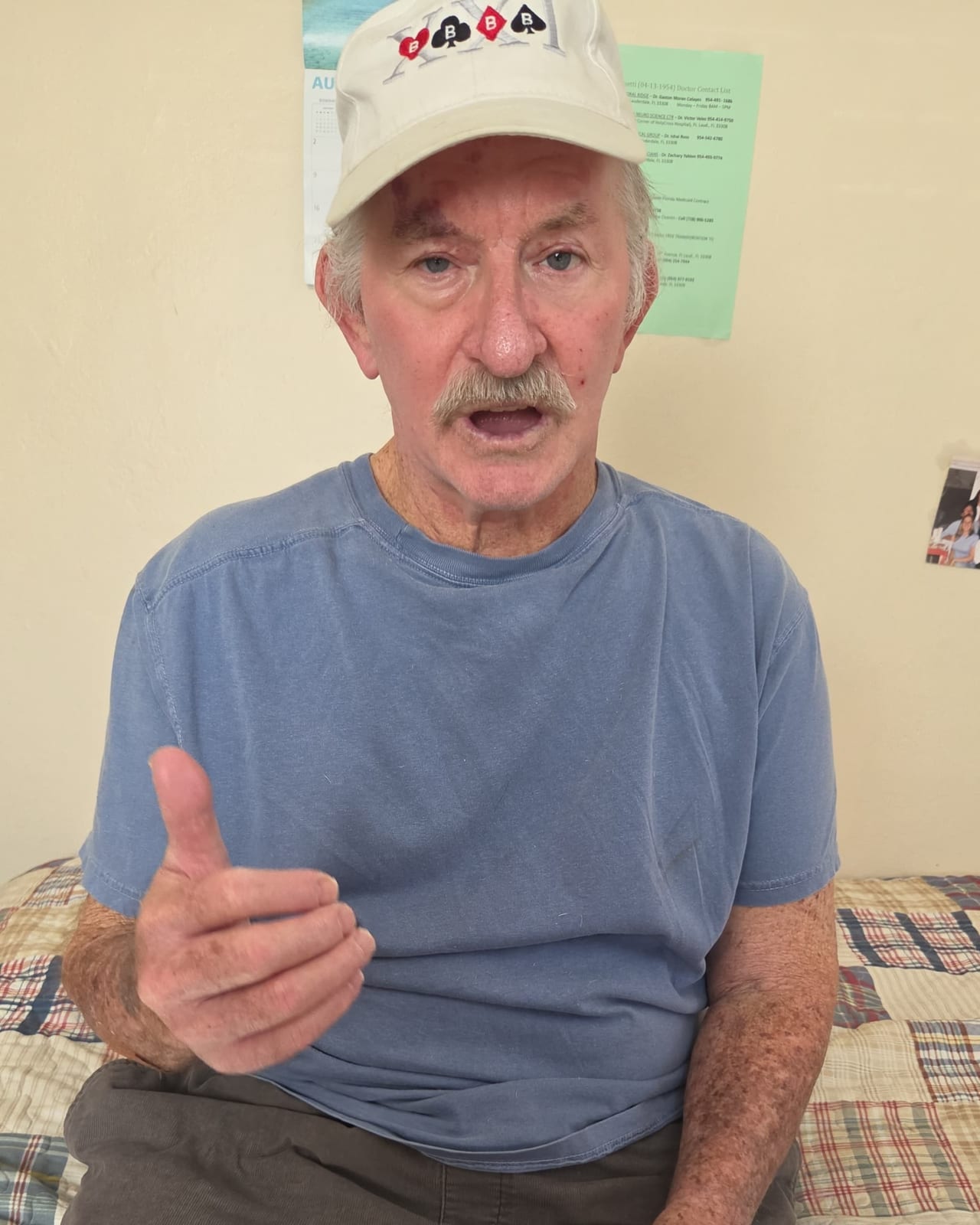A calm indoor moment for a resident at Royal Palm Senior Residence.
